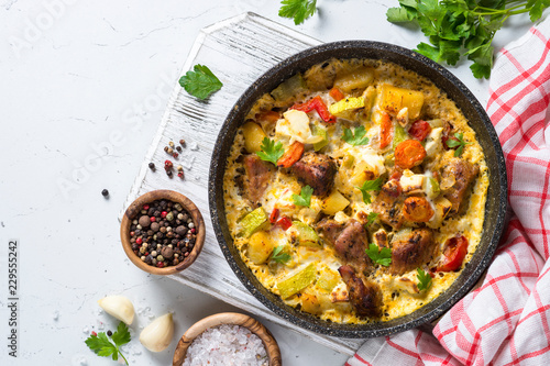 Frittata with meat and vegetables top view.