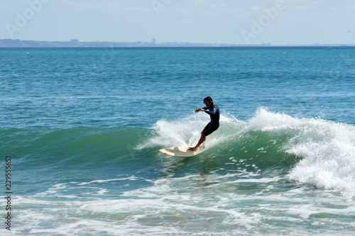 Surfer on the Coast of Malibu Los Angeles California