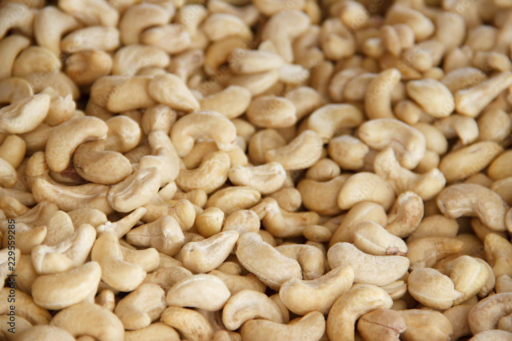 Cashews nut background. kernels of peeled nuts close up Cashews nut background. kernels of peeled nuts close up