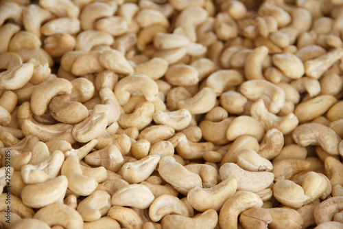 Cashews nut background. kernels of peeled nuts close up