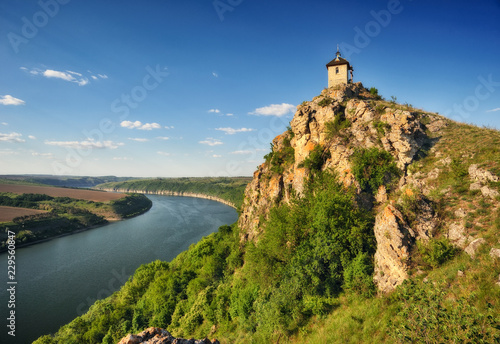 Fototapeta Naklejka Na Ścianę i Meble -  Church on a cliff above the river