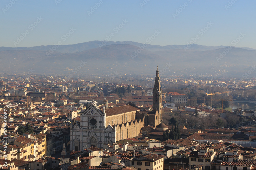 Basilica of Santa Croce, Florence, Italy. Santa Croce church is one of the main landmarks of the city. Aerial scenic view of Santa Croce in summer. Famous Renaissance architecture of Florence.