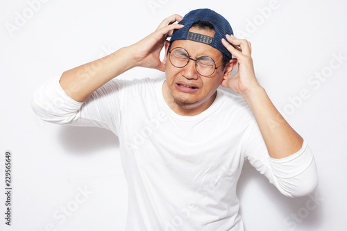 Stressed Young Man Having Headache
