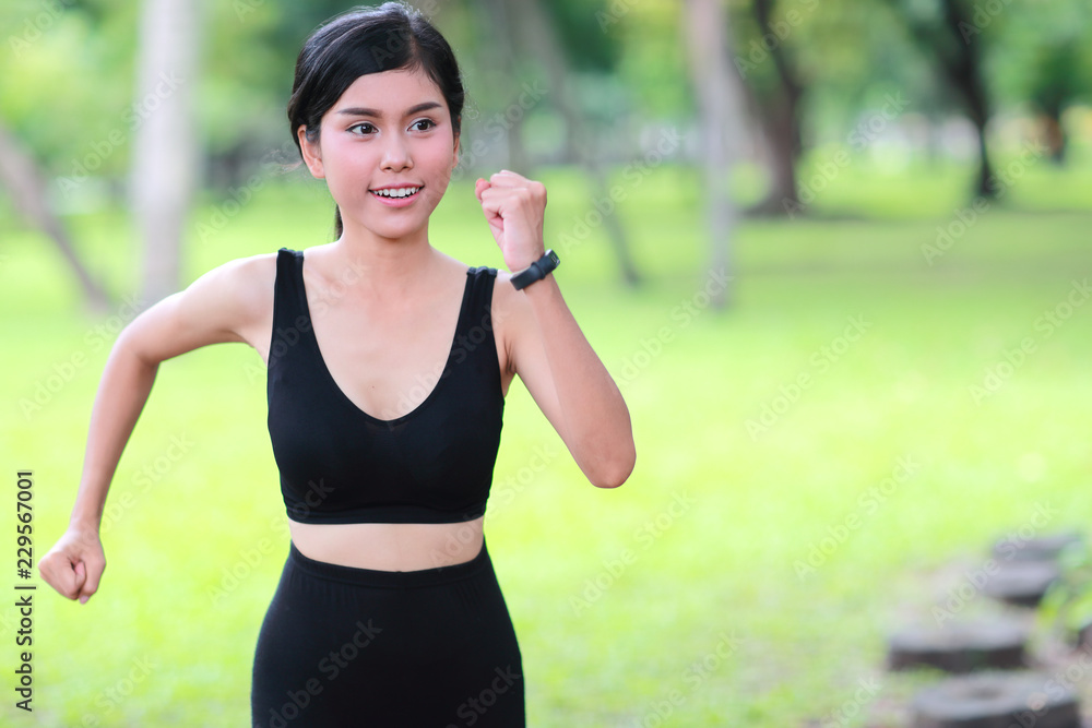young healthy and sporty woman jogging in the park young healthy and sporty woman jogging in the park