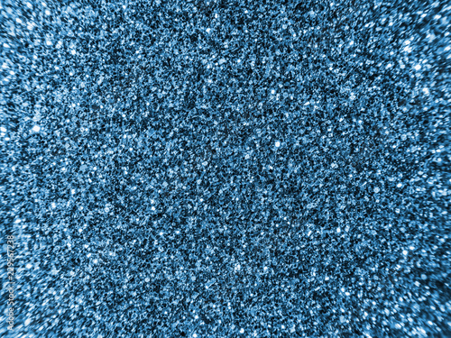 Background sequin. BLUE BACKGROUND. glitter surfactant. Holiday abstract glitter background with blinking lights. Fabric sequins in bright colors. Fashion fabric glitter, sequins.