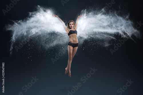 Young woman with powder wings