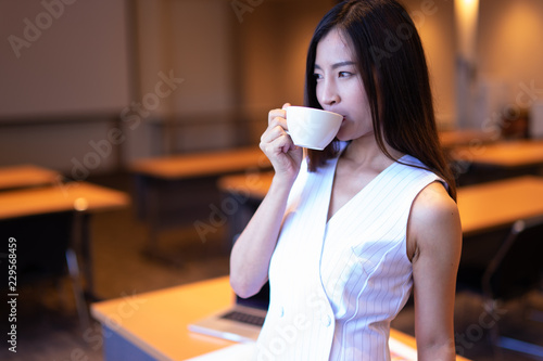 Morning coffee  young happy beautifull woman having coffee before work