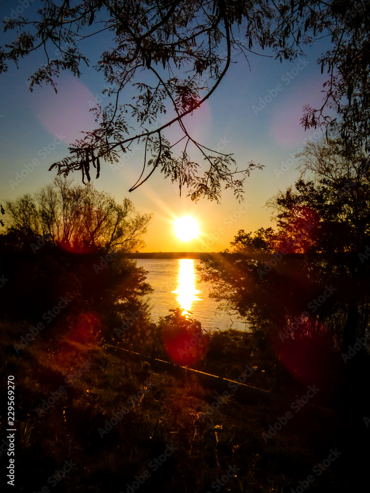 Sunset in the Uruguay river - Uruguaiana, Brazil Sunset in the Uruguay river - Uruguaiana, Brazil