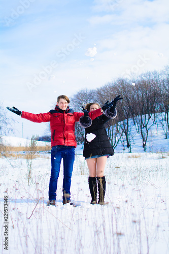 loving young couple in winter in park