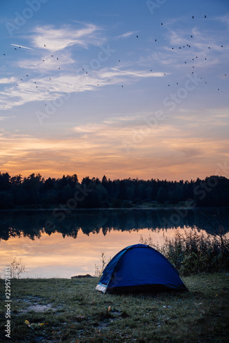 Camping at the lake on sunset
