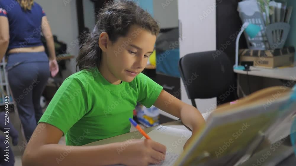 little girl daughter do homework lesson school. slow motion video ...