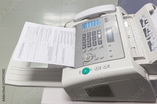 The fax machine for Sending documents in the office concept equipment needed in office