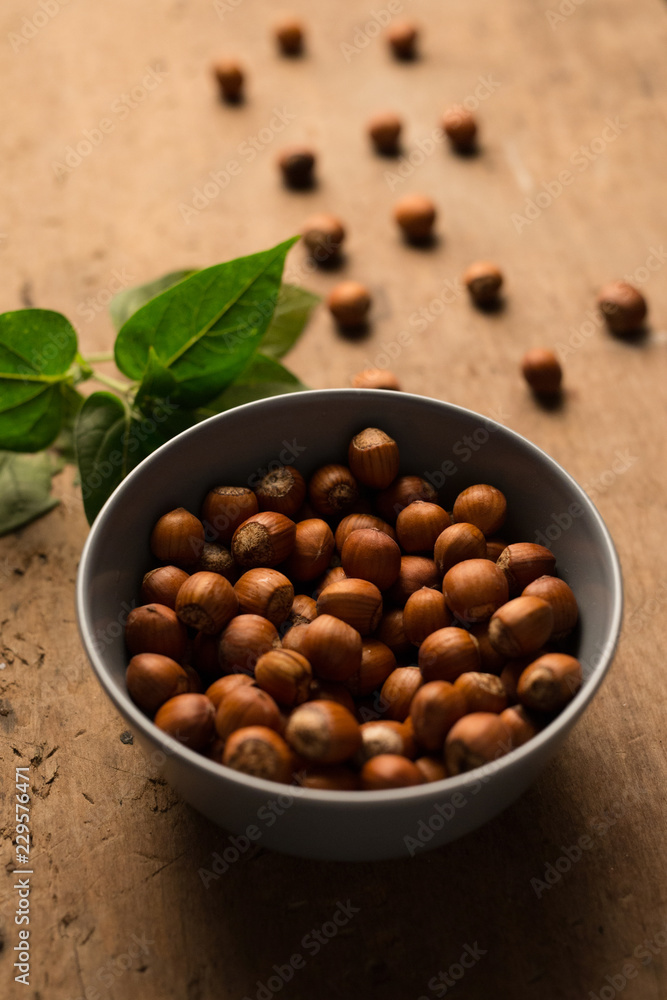 hazelnuts with wood background hazelnuts with wood background