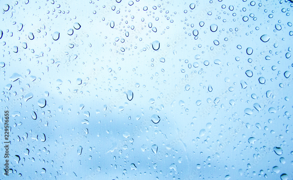 water drops or rain drops on glass background water drops or rain drops on glass background