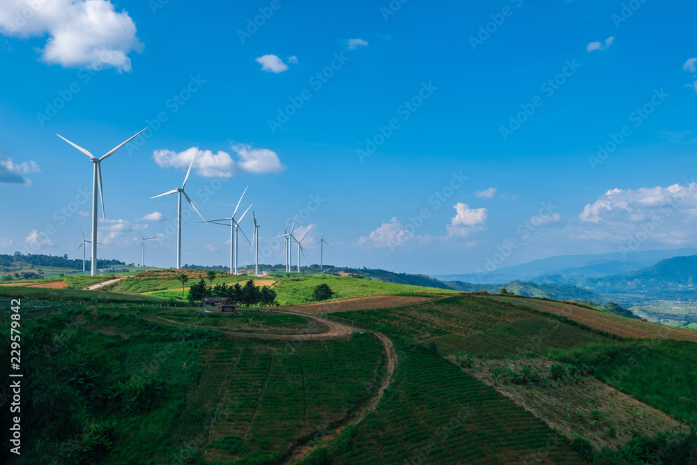 clean energy turbine farm with a hut and crop farm