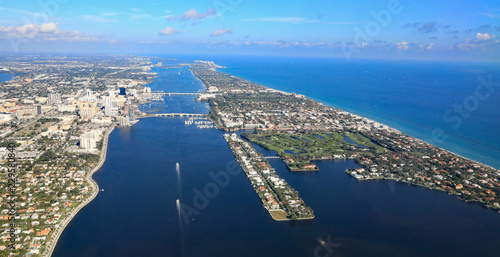 Aerial view of downtown West Palm Beach, Florida, with the Lake Worth Lagoon, and Palm Beach,  in South Florida.