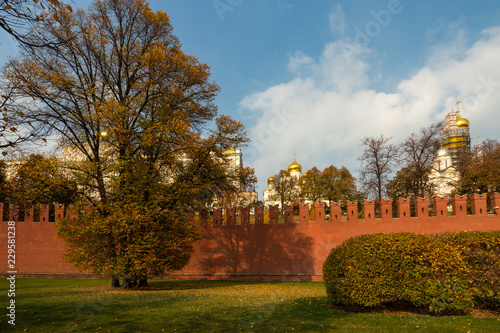 Moscow Kremlin wall, golden domes of Annunciation cathedral in autumn