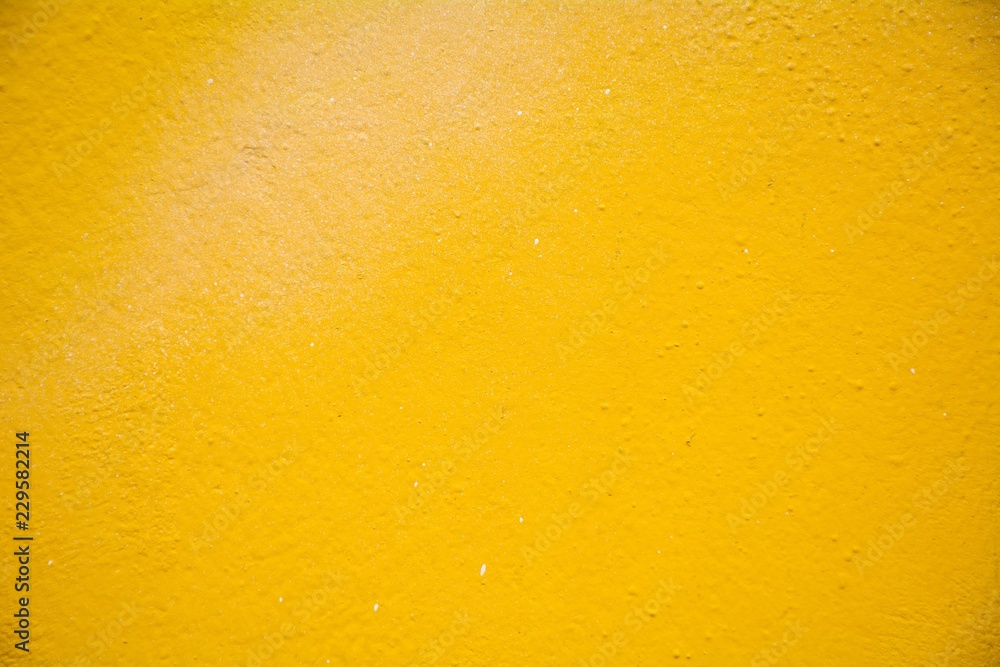 yellow cement wall texture - closeup yellow cement wall texture - closeup