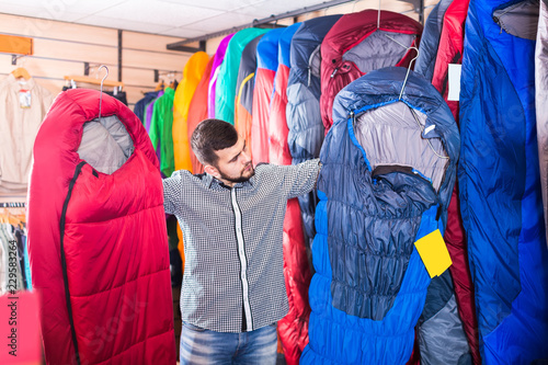 Buyer is considering the options for sleeping bags