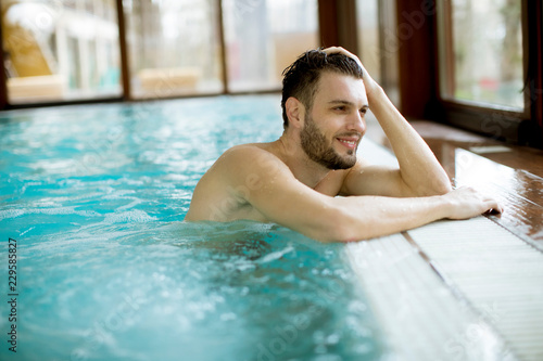 Handsome young man relaxing...