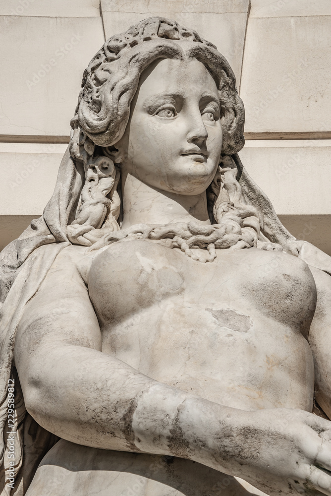 Statue of sensual busty and puffy renaissance era woman in Vienna, Austria,  details, closeup Stock Photo