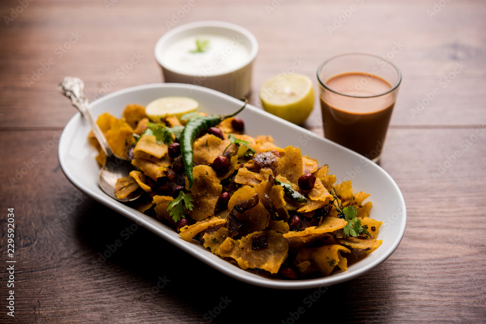 Homemade Kothu Parotta/ Paratha or Stir Fried Leftover Chapati Masala or fodnichi poli in marathi, served in a bowl or plate with curd and hot tea. Selective focus Homemade Kothu Parotta/ Paratha or Stir Fried Leftover Chapati Masala or fodnichi poli in marathi, served in a bowl or plate with curd and hot tea. Selective focus
