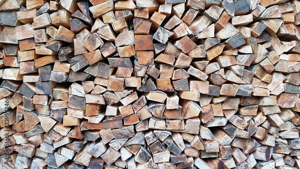 Dry chopped firewood logs ready for winter Dry chopped firewood logs ready for winter