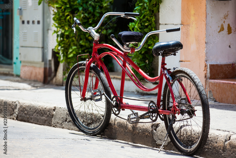 Bicycle parked at the beautiful streets of the walled city in Cartagena de Indias
