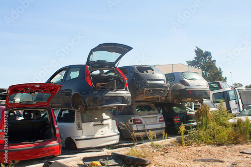 A graveyard of cars, broken cars sell on spare parts.