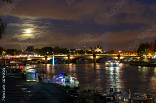 Concorde bridge over Seine river at night, Paris, France