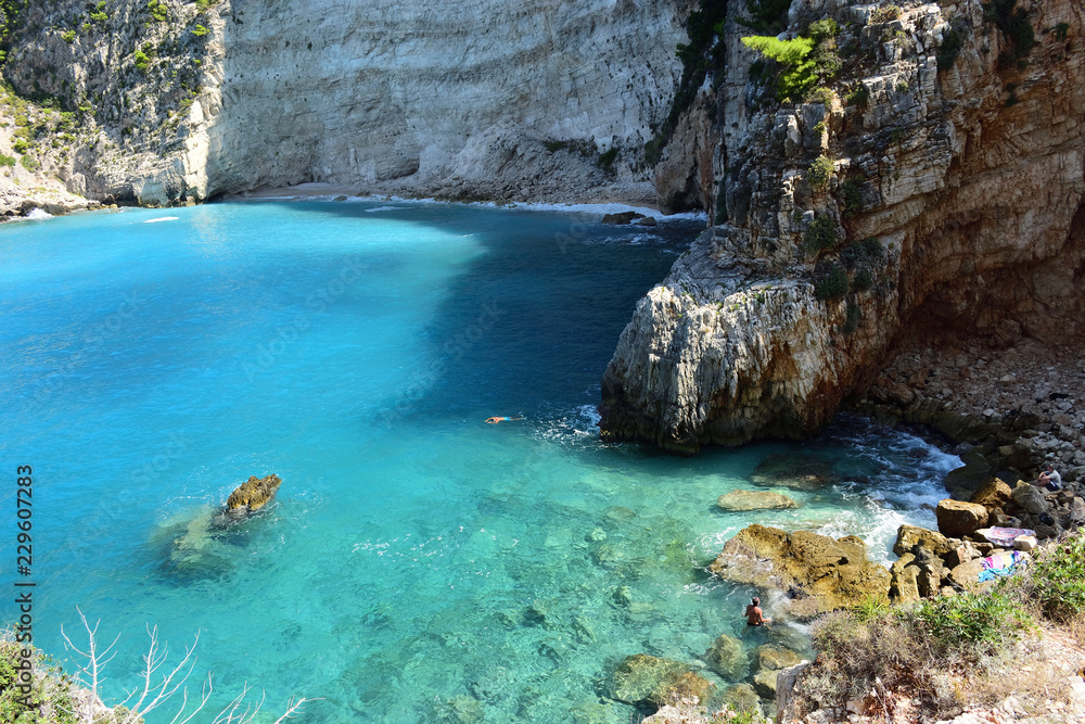 Naklejka premium The turquoise waters of the Ionian Sea at the Filipoi Beach, Zakynthos Island, Greece