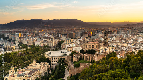 Aerial panoramic view of Malaga city  Andalusia  Spain during beautiful sunset