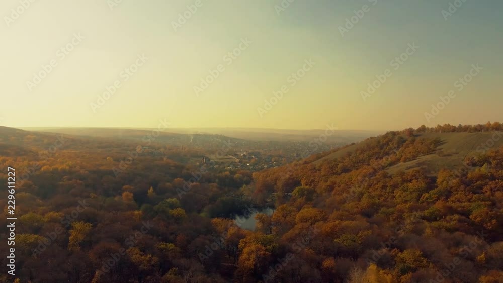 Lake in the middle of autumn forest Lake in the middle of autumn forest