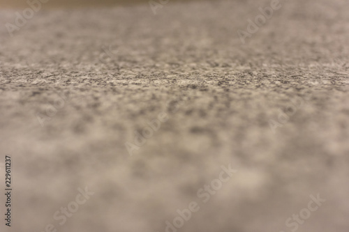 Texture of smooth fabric closeup. Abstract background of the surface of the rug with selective focus.