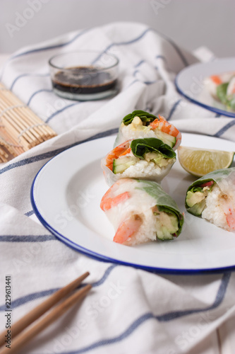 Spring roll with shrimp and sauce on a plate 