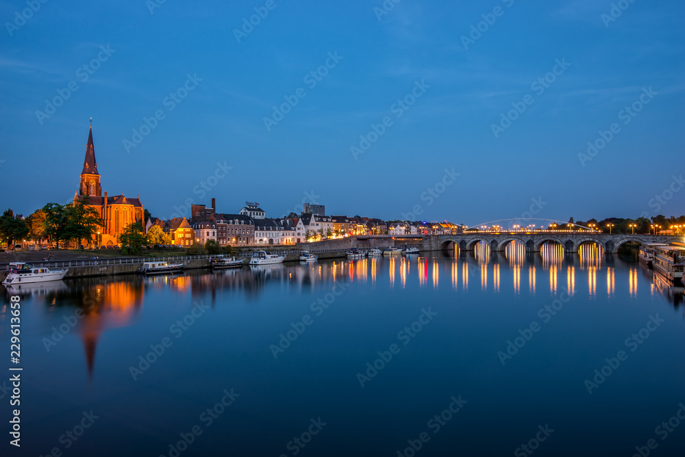View on the river Meuse in Maastricht during the evening View on the river Meuse in Maastricht during the evening