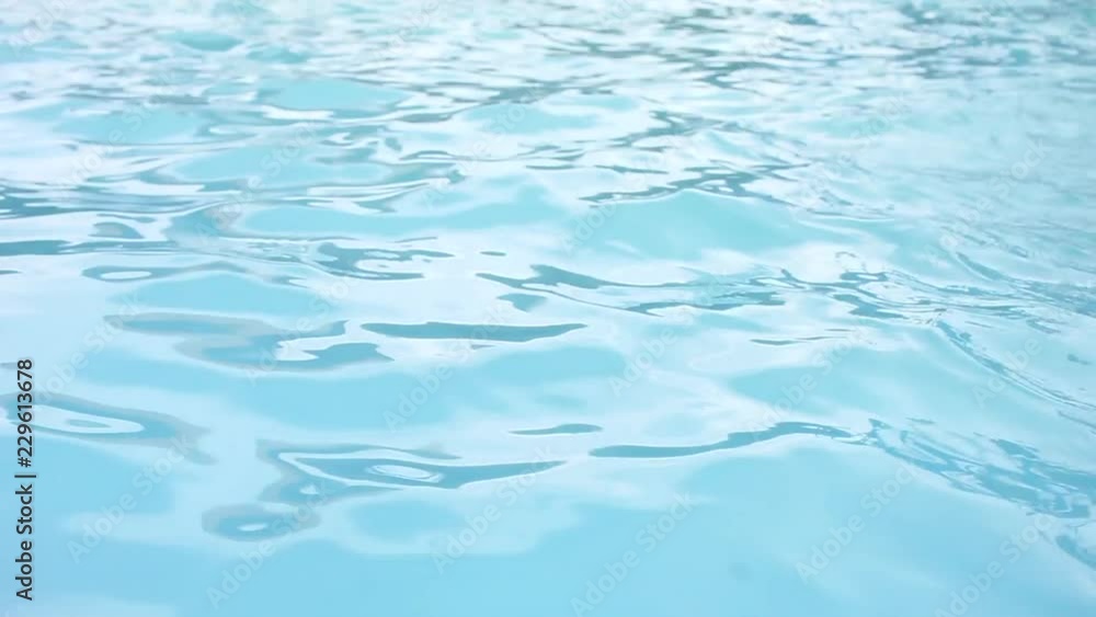 Beautiful refreshing blue swimming pool water Beautiful refreshing blue swimming pool water