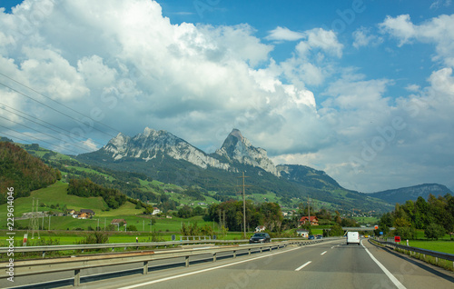 View of the road from the car window in sunny Europe