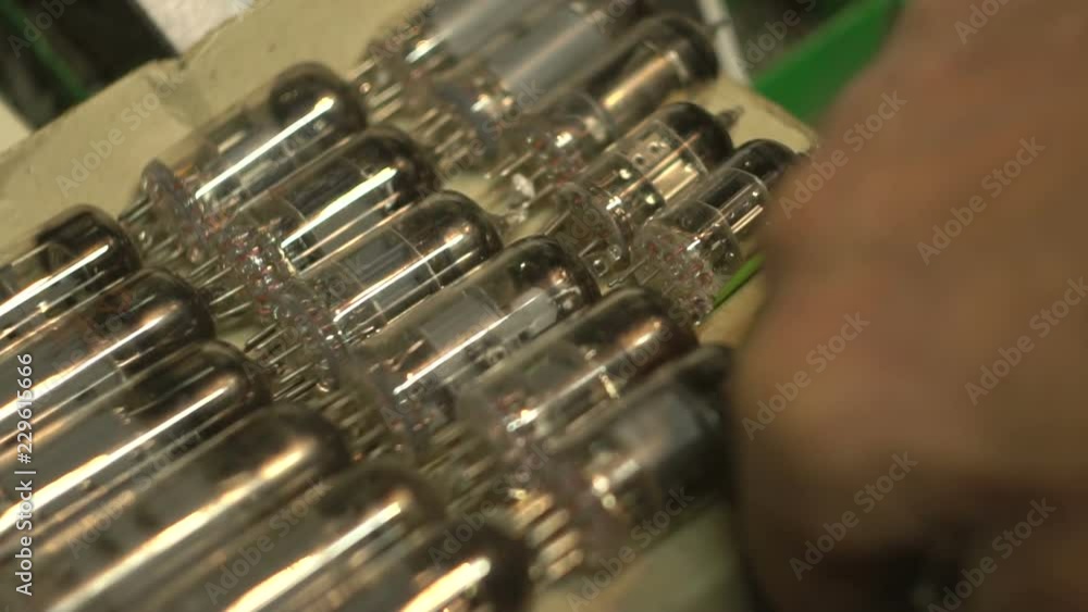 man makes up a series of vacuum tubes man makes up a series of vacuum tubes