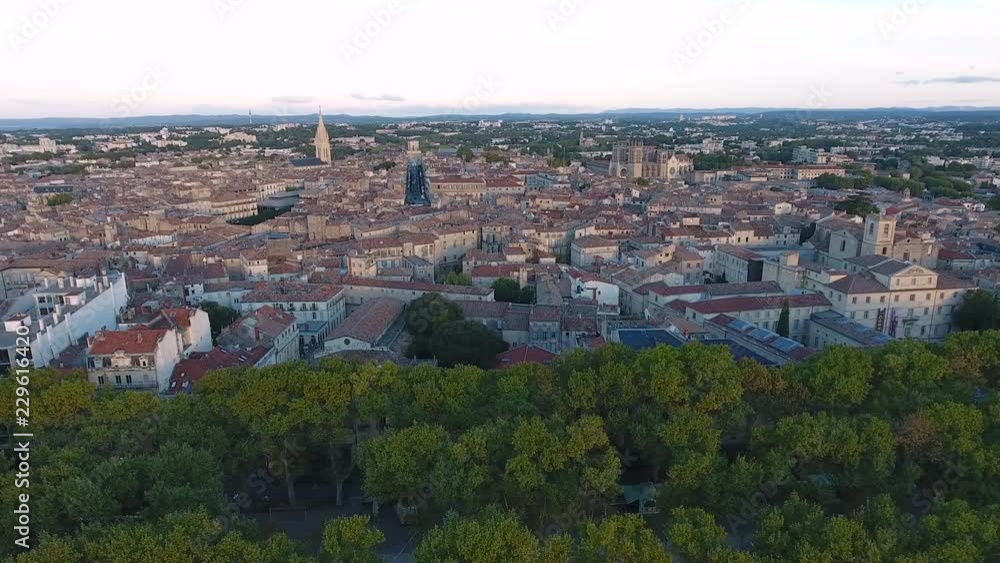Montpellier city center by drone. Trees in front and Ecusson in background. 