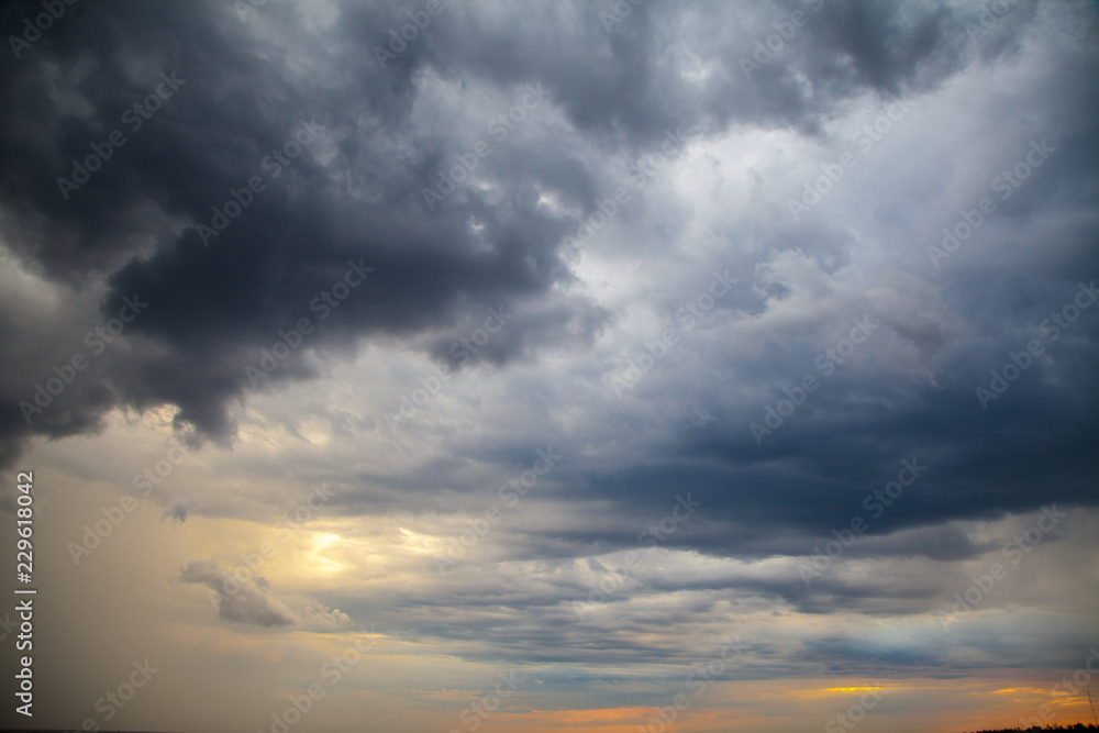 the evening sky in the clouds at sunset the evening sky in the clouds at sunset