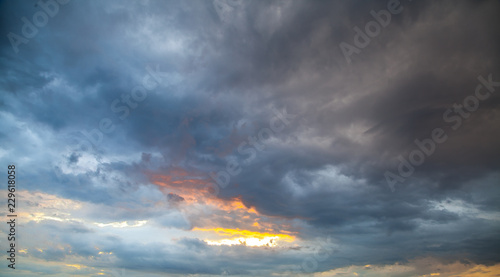 the evening sky in the clouds at sunset