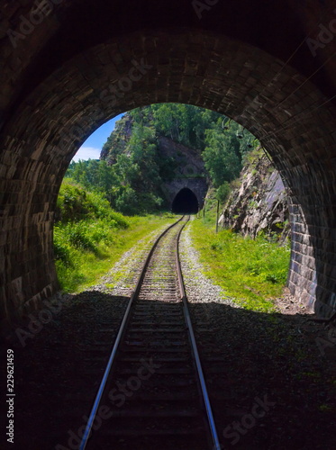 Two old stone mountains railway tunnels on the Circum-Baikal railway on the shore of Baikal as a section of the Trans-Siberian Railway