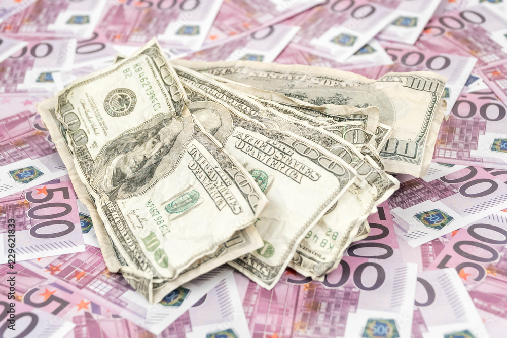 Crumpled dollars on a background of euro Crumpled dollars on a background of euro