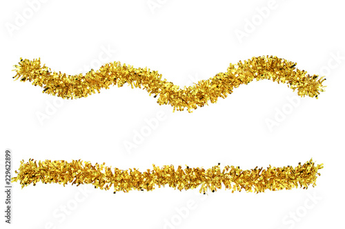 Christmas gold tinsel for decoration. White isolate photo