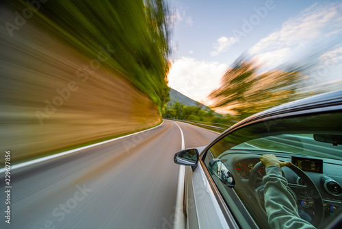Car in motion blur driving in the Mountains © pozdeevvs