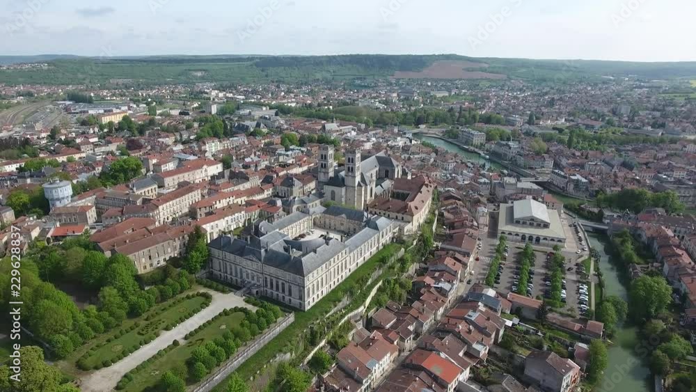 Flying by drone towards Verdun Cathedral in Lorraine, France. Sunny day Flying by drone towards Verdun Cathedral in Lorraine, France. Sunny day