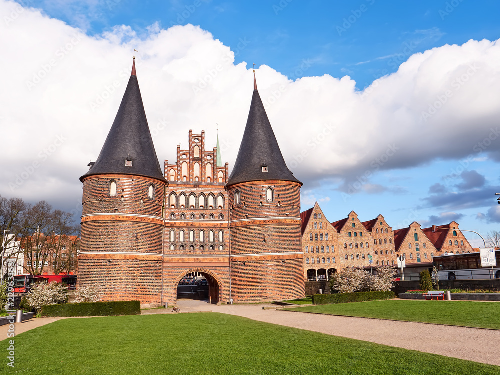 Historical Holstentor City Gate in Lubeck. View at sunny day.