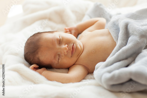 Cute infant boy is sleeping. 
