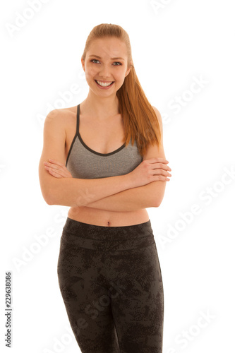 Beautiful young fit woman with great shape isolated over white background